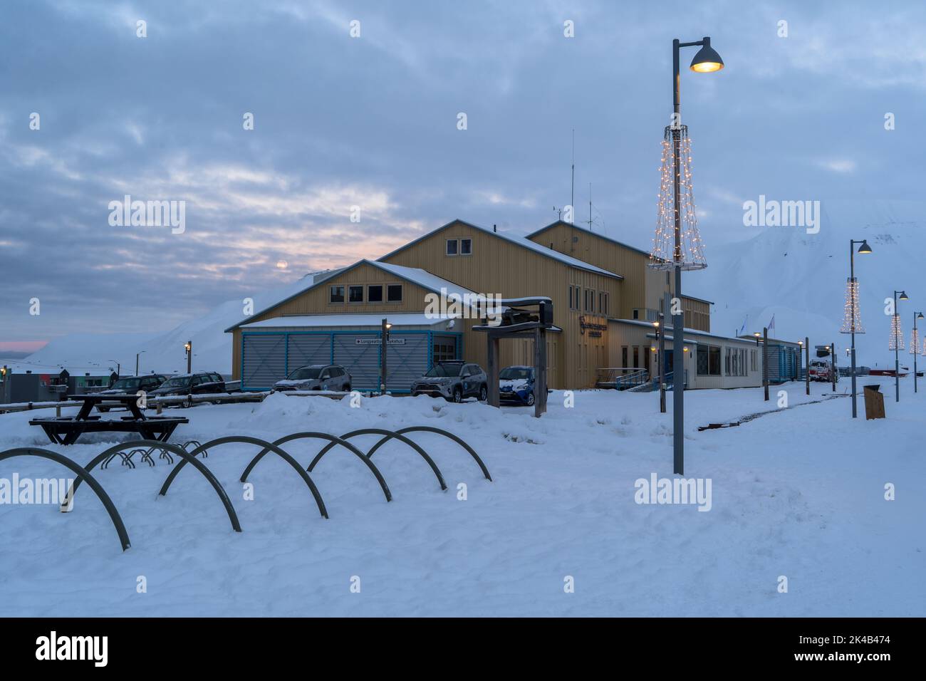 Longyearbyen hospital and bicycle rack, winter snow day, Svalbard Stock Photo