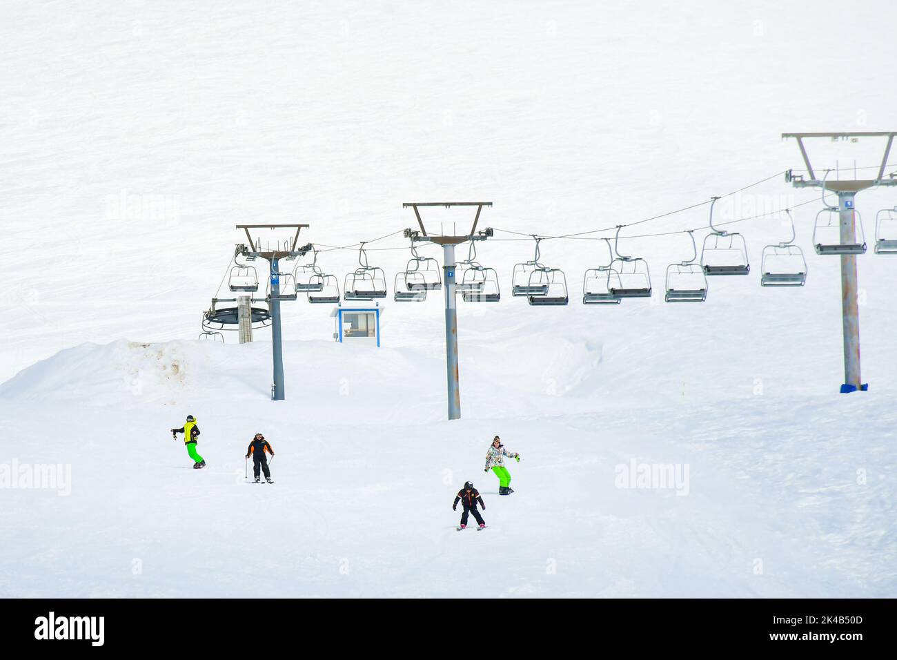 Gudauri, 25th february, 2022 group of kids in ski snowboard