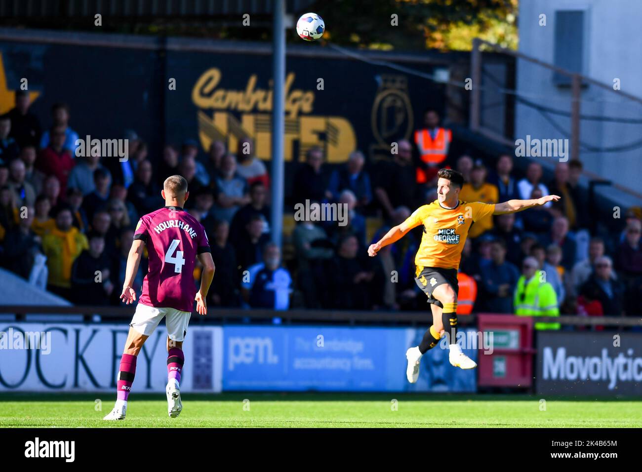 Cambridge, UK. 1st October 2022George Williams (2 Cambridge United) jumps during the Sky Bet League 1 match between Cambridge United and Derby County at the R Costings Abbey Stadium, Cambridge on Saturday 1st October 2022. (Credit: Kevin Hodgson | MI News) Credit: MI News & Sport /Alamy Live News Stock Photo