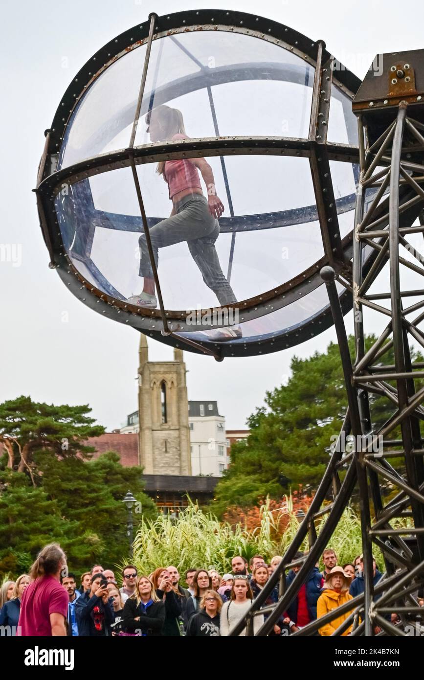 Bournemouth, Dorset, UK, Saturday 1st October 2022. Timeless by dance, circus and theatre company Joli Vyann, representing the threat of irreversible climate change, performed with acrobatic skill and athleticism in Lower Gardens as part of the annual Arts by The Sea Festival. Credit: Paul Biggins/Alamy Live News Stock Photo