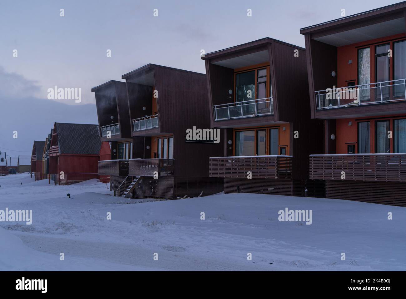 Residential buildings on stilts on a cold winter day in Longyearbyen