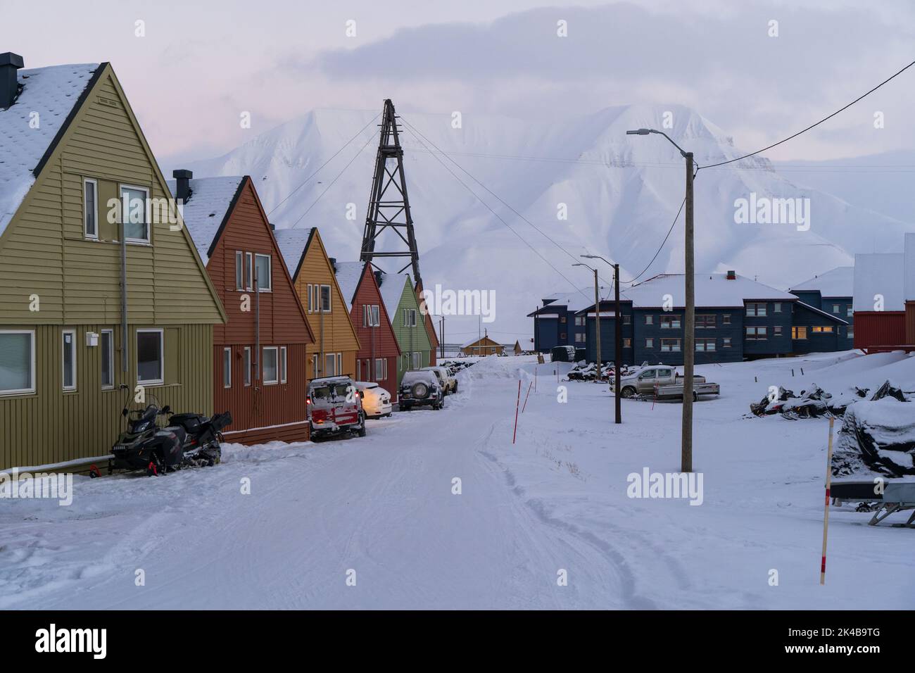 Colourful residential houses on stilts on a cold winter day in Longyearbyen, Svalbard Stock Photo
