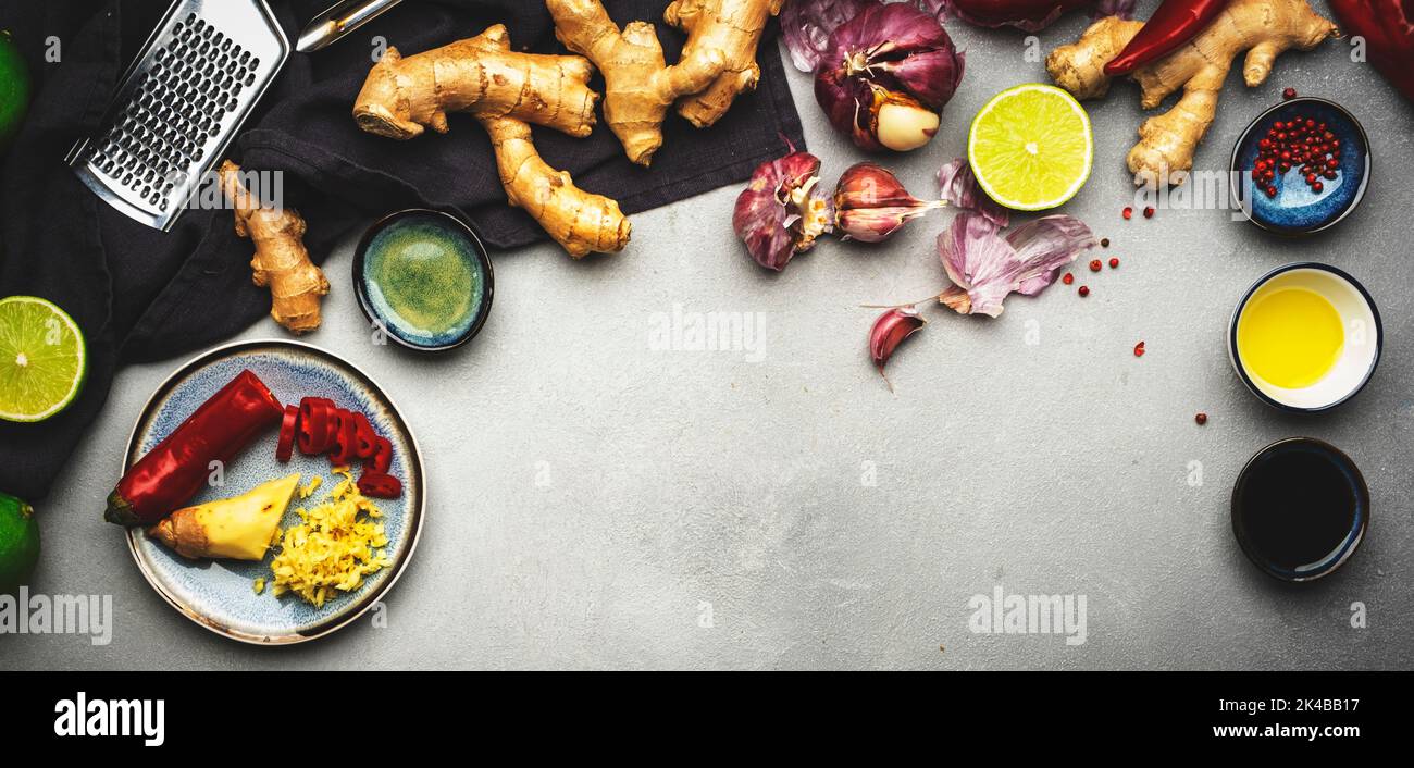 Asian cuisine ingredients, food background. Ginger, lime, chili pepper