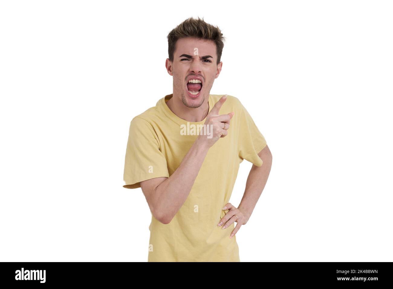 Young caucasian man scolding at camera, isolated. Stock Photo