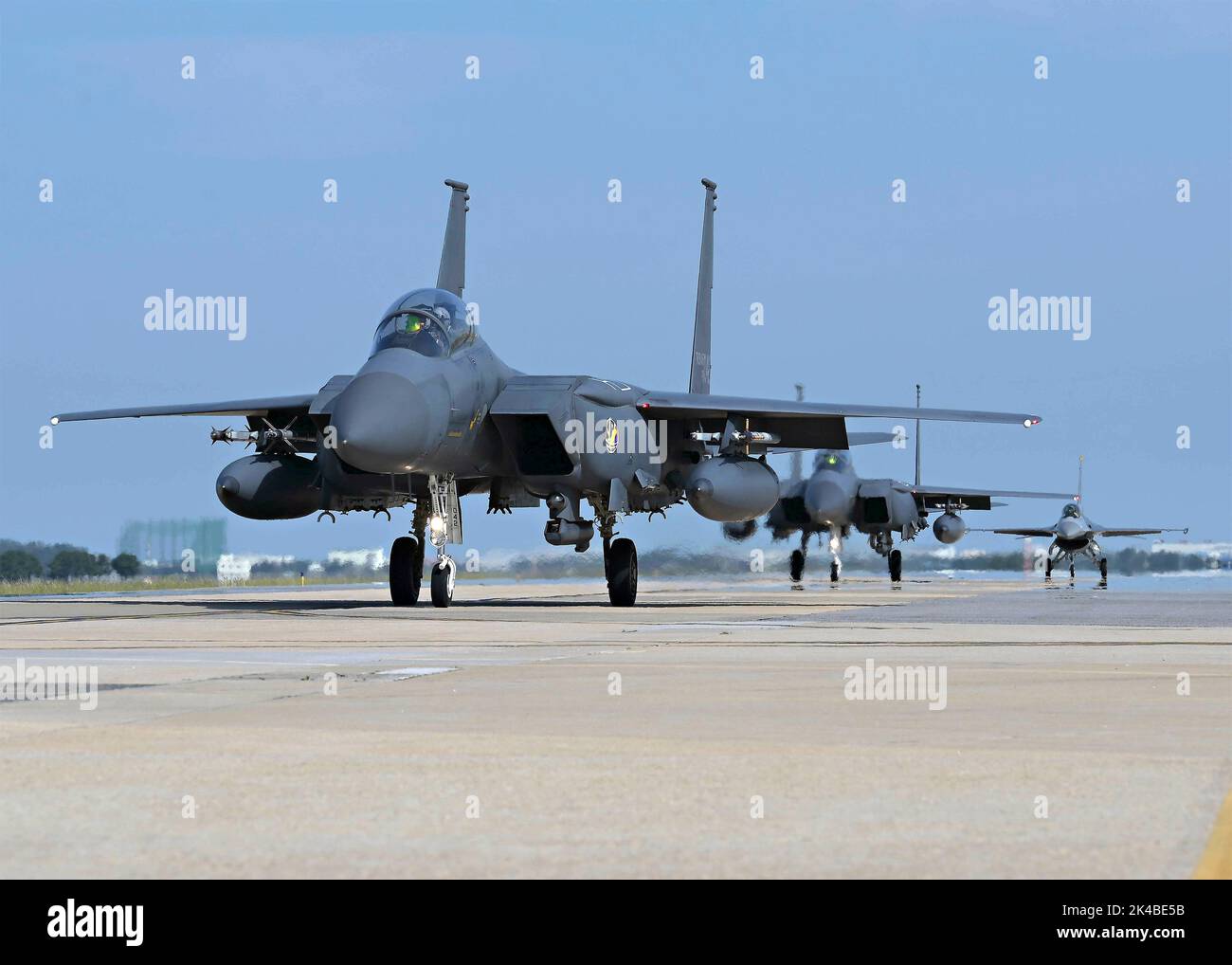 Gunsan, South Korea. 22 September, 2022. Republic of Korea Air Force F-15K Slam Eagle fighter aircraft, assigned to the ROK 110th Fighter Squadron, taxi on the flightline at Kunsan Air Base, September 22, 2022 in Gunsan, South Korea. Stock Photo
