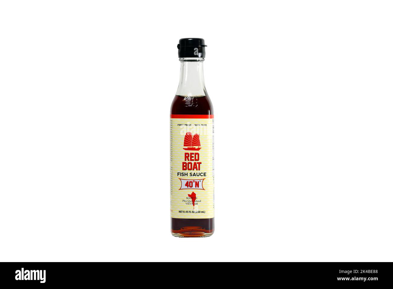 A bottle of Red Boat fish sauce isolated on a white background. cutout image for illustration and editorial use. nuoc mam or vietnamese fish sauce Stock Photo