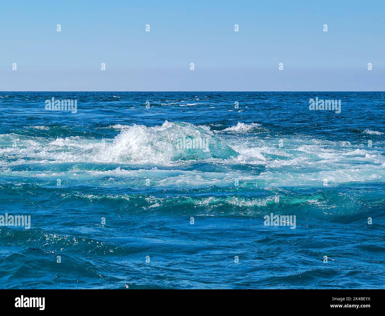 Power plant warm water discharge bubbling effect in Lake Michigan Stock Photo