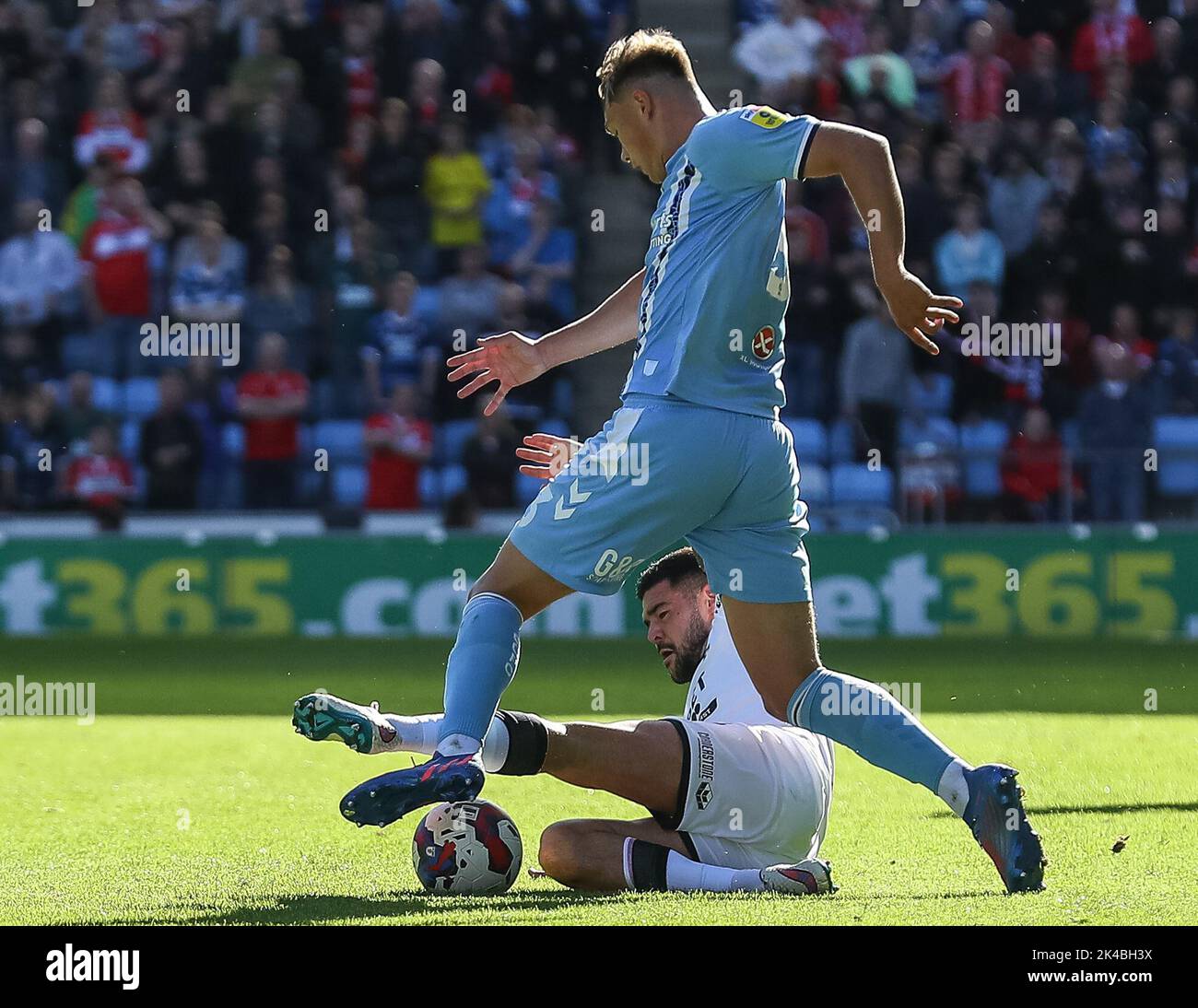 Coventry, UK. 01st Oct, 2022. Alex Mowatt #4 of Middlesbrough tackles Callum Doyle #3 of Coventry City during the Sky Bet Championship match Coventry City vs Middlesbrough at Coventry Building Society Arena, Coventry, United Kingdom, 1st October 2022 (Photo by Gareth Evans/News Images) in Coventry, United Kingdom on 10/1/2022. (Photo by Gareth Evans/News Images/Sipa USA) Credit: Sipa USA/Alamy Live News Stock Photo