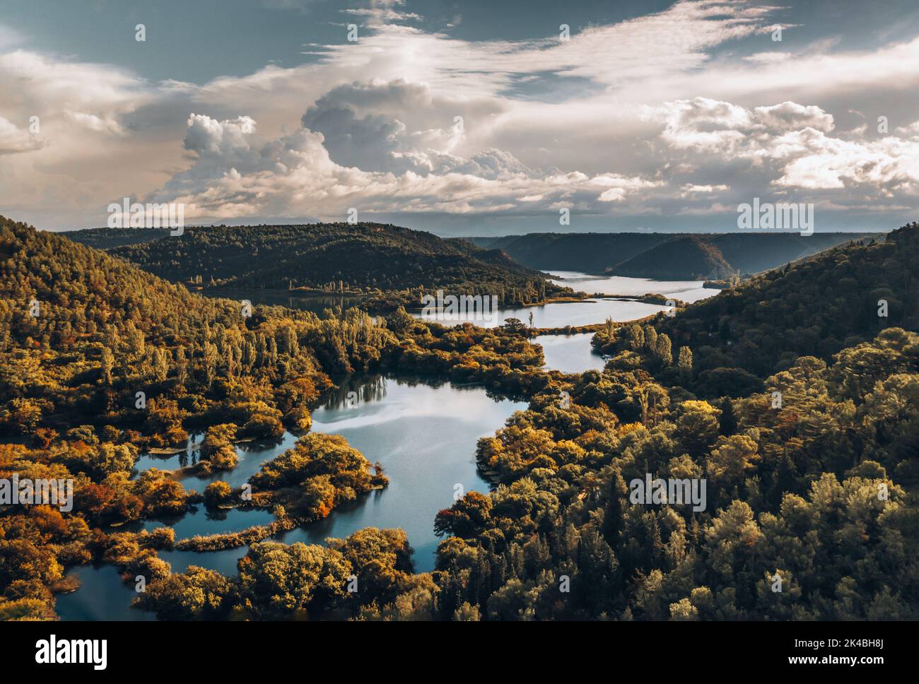 Aerial drone view over dreamy sunrise light covering the beautiful Krka River and waterfalls.Fantastic scene of Krka National Park in September Stock Photo