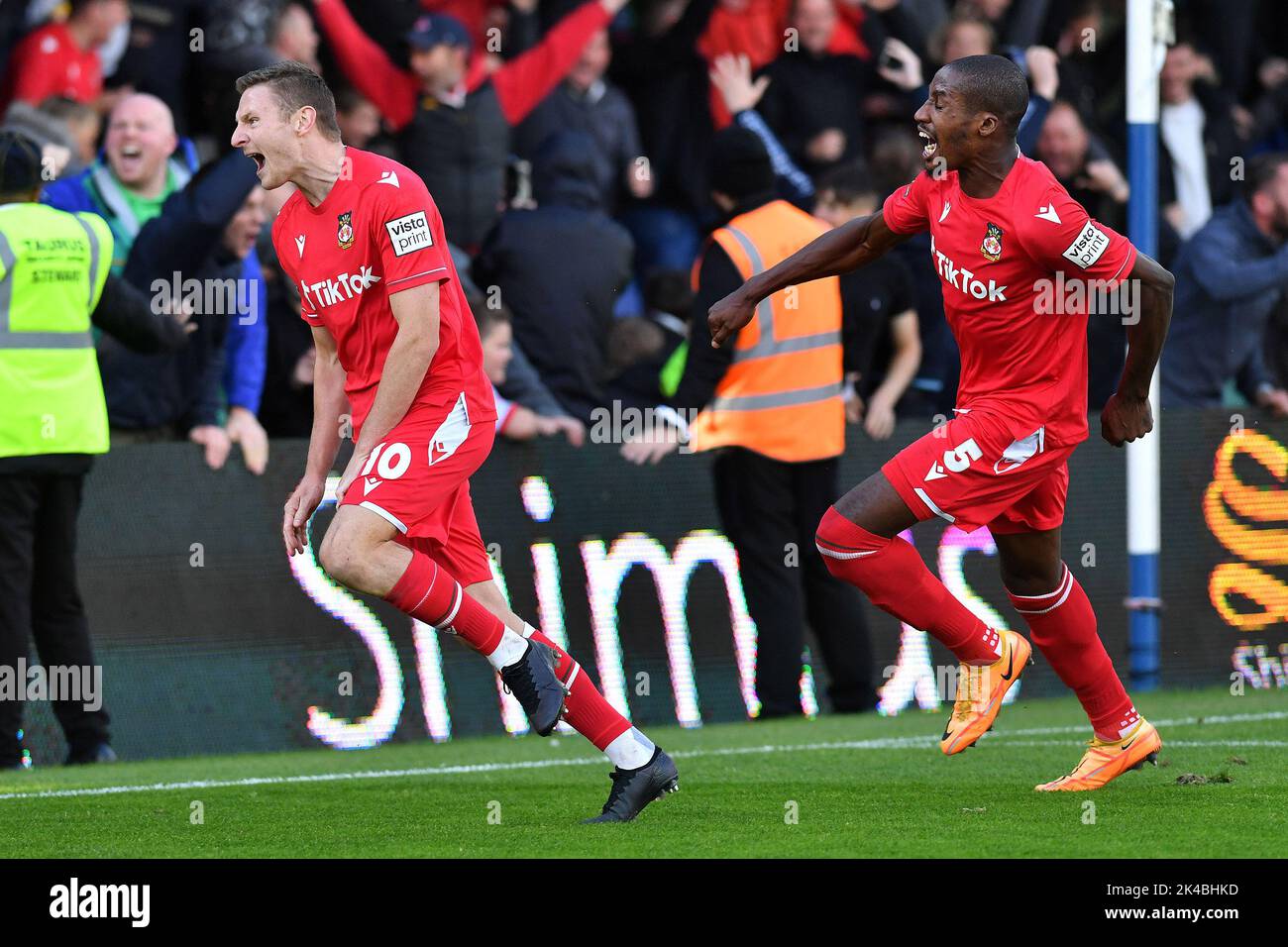 Oldham, UK. 1st October 2022during the Vanarama National League match between Oldham Athletic and Wrexham at Boundary Park, Oldham on Saturday 1st October 2022Paul Mullin of Wrexham Football Club celebrates scoring his side's second goal of the game during the Vanarama National League match between Oldham Athletic and Wrexham at Boundary Park, Oldham on Saturday 1st October 2022. Credit: MI News & Sport /Alamy Live News Stock Photo