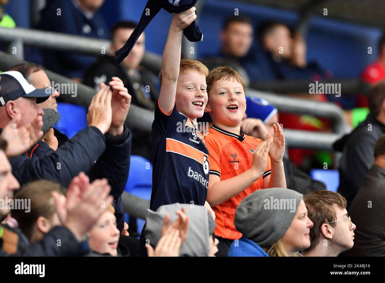 Oldham, UK. 1st October 2022during the Vanarama National League match between Oldham Athletic and Wrexham at Boundary Park, Oldham on Saturday 1st October 2022Oldham Athletic fans during the Vanarama National League match between Oldham Athletic and Wrexham at Boundary Park, Oldham on Saturday 1st October 2022. Credit: MI News & Sport /Alamy Live News Stock Photo