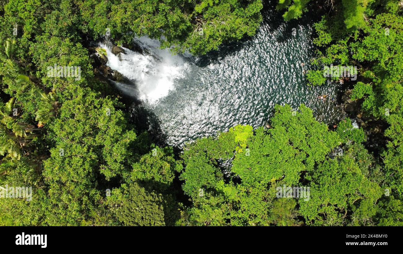 A waterfall in the middle of a forest, aerial Stock Photo - Alamy