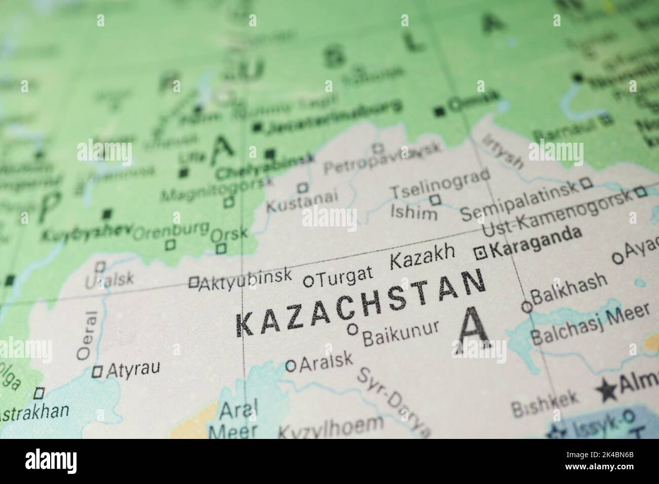 Kazakhstan on the map or globe in Dutch language. In Netherlands it is Kazachstan. World geography. Stock Photo