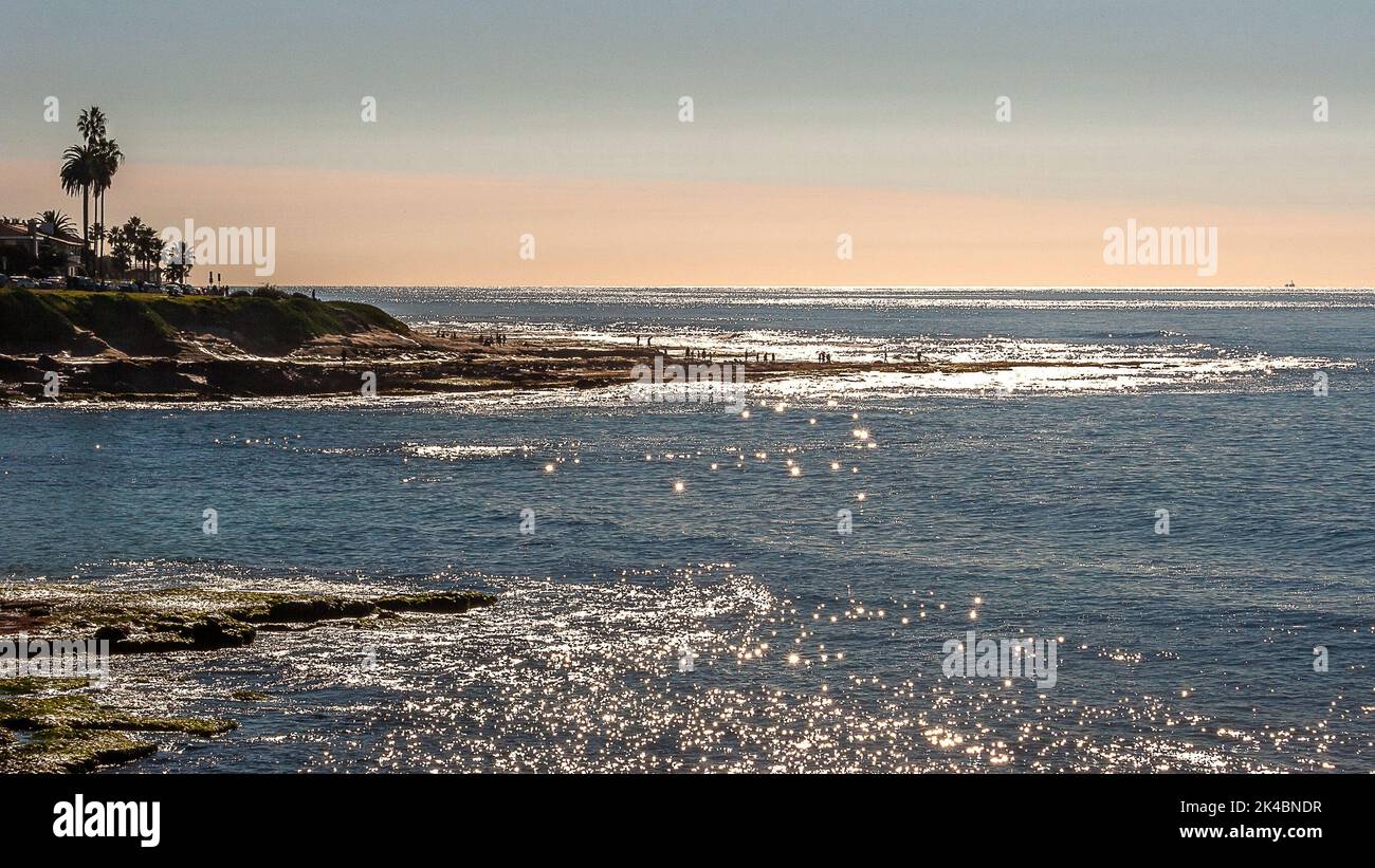 The beautiful view of the sunset reflected on the sea Stock Photo - Alamy