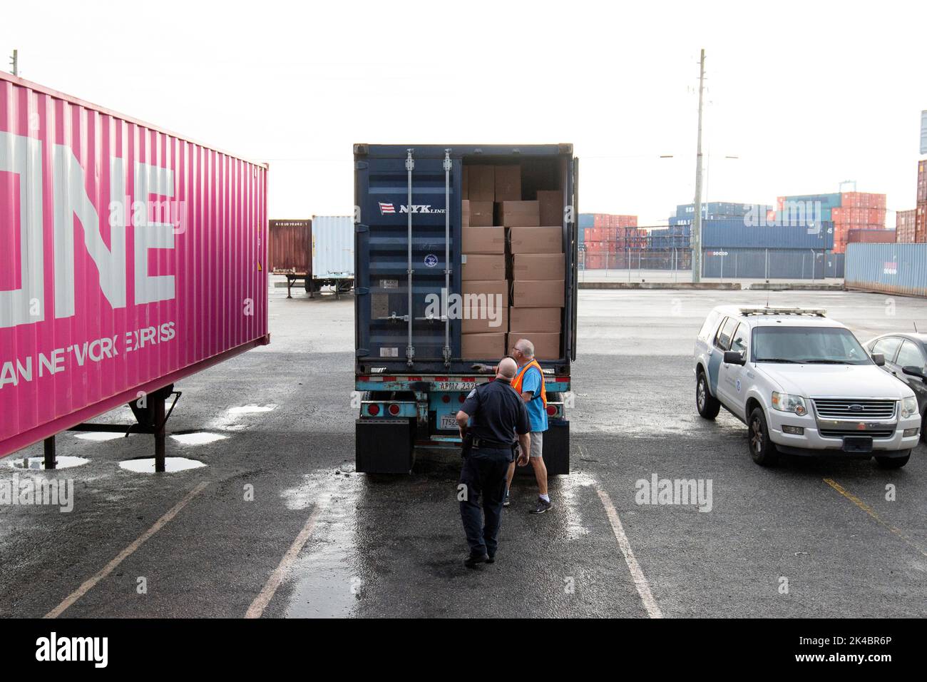 Customs and Border Protection officers and import specialists assigned to the Area Port of Jacksonville, inspect shipments of possible intellectual property rights violations on Feb. 21. Photo by Ozzy Trevino, U.S. Customs and Border Protection Stock Photo