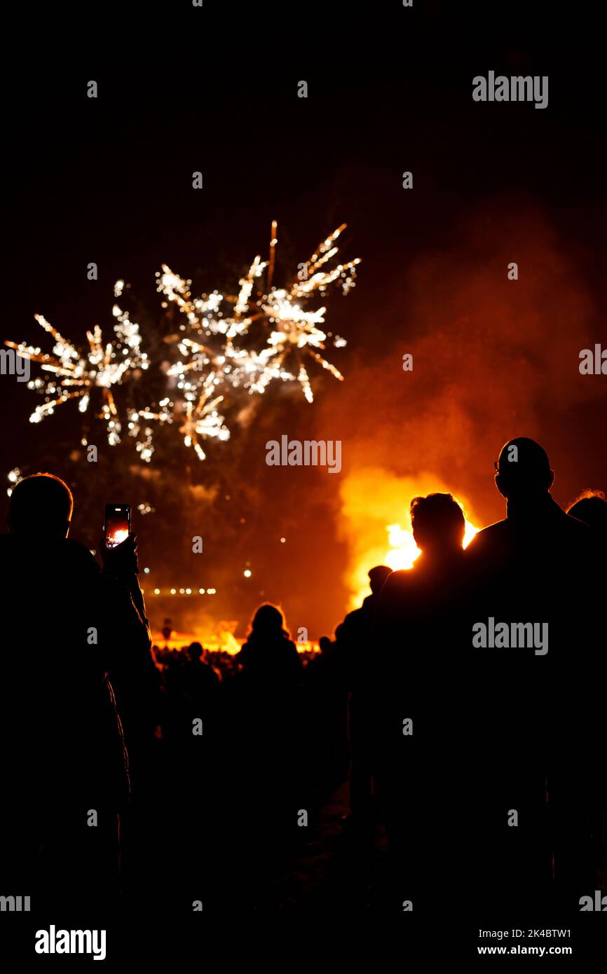 Eastbourne, UK. 1st Oct 2022. Spectators enjoy this evenings bonfire night celebrations in Eastbourne.  Towns in Sussex stagger their events so as not to clash with each other.  Eastbourne, East Sussex,UK. Credit: Ed Brown/Alamy Live News Stock Photo