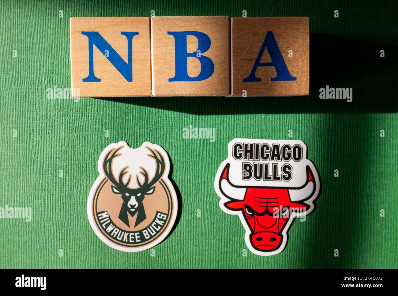 April 18, 2022, New York, USA. Emblems of the playoff clubs of the Chicago Bulls and Milwaukee Bucks National Basketball Association. Stock Photo