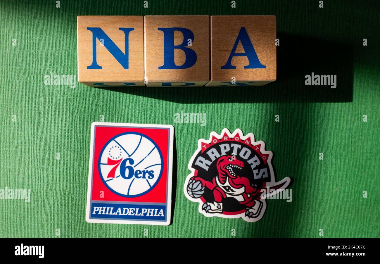 April 18, 2022, New York, USA. Emblems of the Toronto Raptors and Philadelphia 76ers National Basketball Association playoffs. Stock Photo