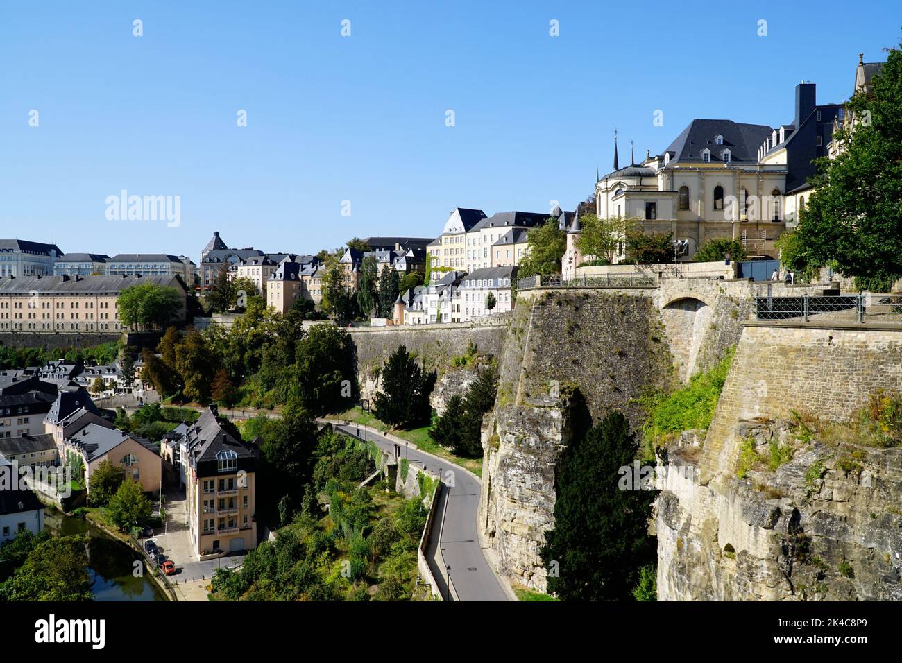 An aerial view of an asphalt road and buildings in Luxembourg in sunny weather Stock Photo