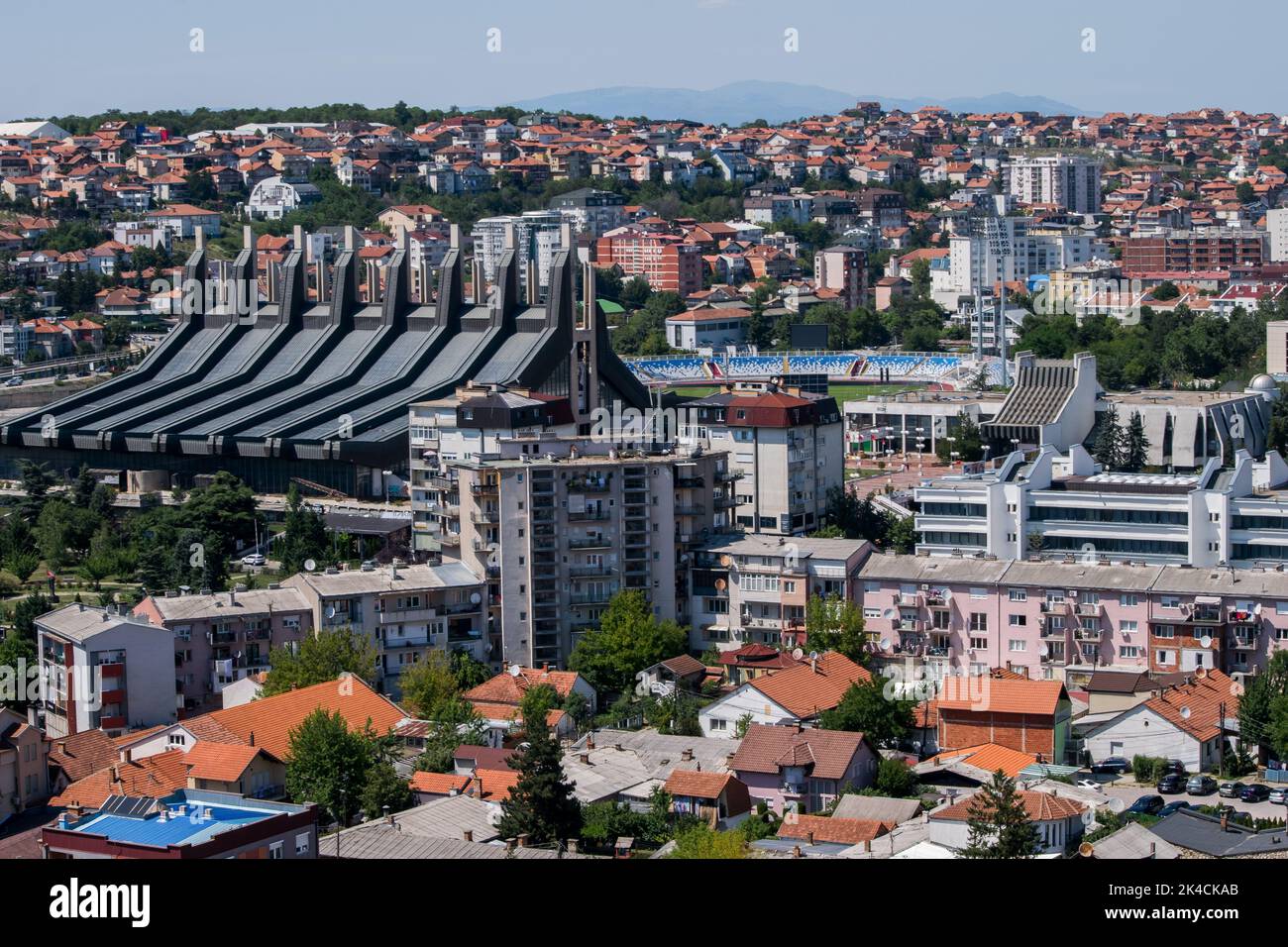 An elevated panoramic cityscape of Pristina, capital city of Kosovo