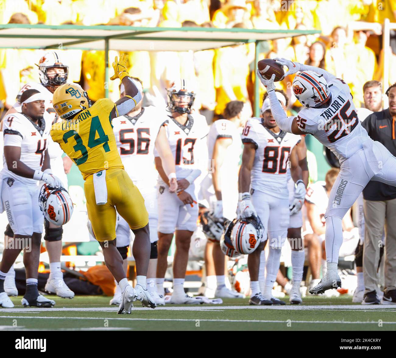 October 1, 2022: Oklahoma State safety Jason Taylor II (25) intercepts a Blake Shapen pass intended for Baylor wide receiver Josh Cameron (34) in the 4th quarter of an NCAA college football game to help seal a 36-25 victory for Oklahoma State on Oct. 1, 2022, in Waco, Texas. (Credit Image: © Scott Coleman/ZUMA Press Wire) Stock Photo