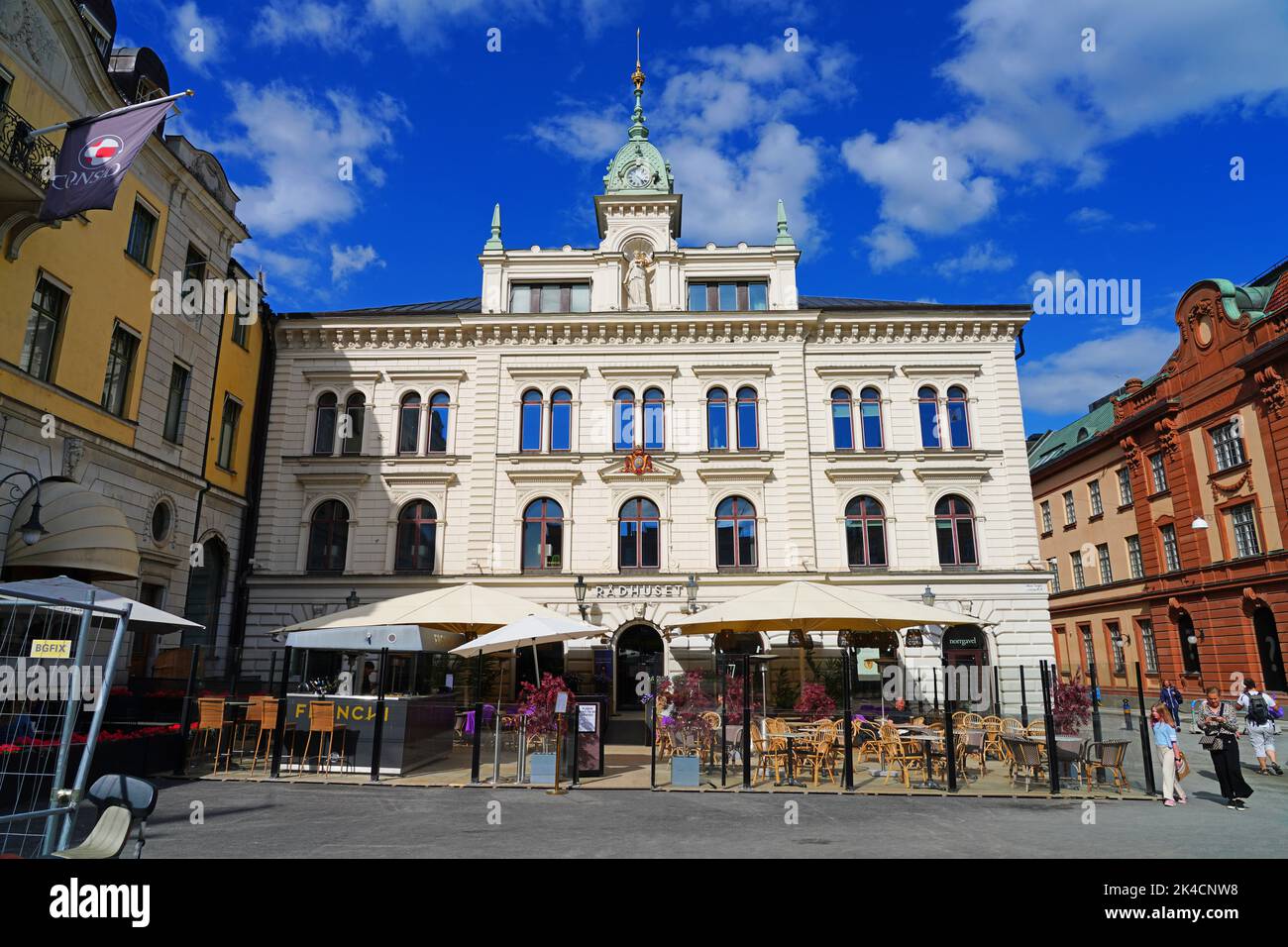 UPPSALA, SWEDEN -1 JUN 2022- View of buildings on the street in downtown Uppsala, a university town in Sweden, on the Fyrisan river. Stock Photo