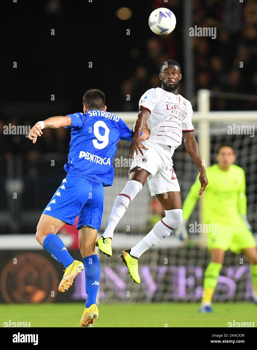 Empoli, Italy. 1st Oct, 2022. AC Milan's Fikayo Tomori (R) vies with Empoli's Martin Satriano during a Serie A football match between AC Milan and Empoli in Empoli, Italy, on Oct. 1, 2022. Credit: Daniele Mascolo/Xinhua/Alamy Live News Stock Photo