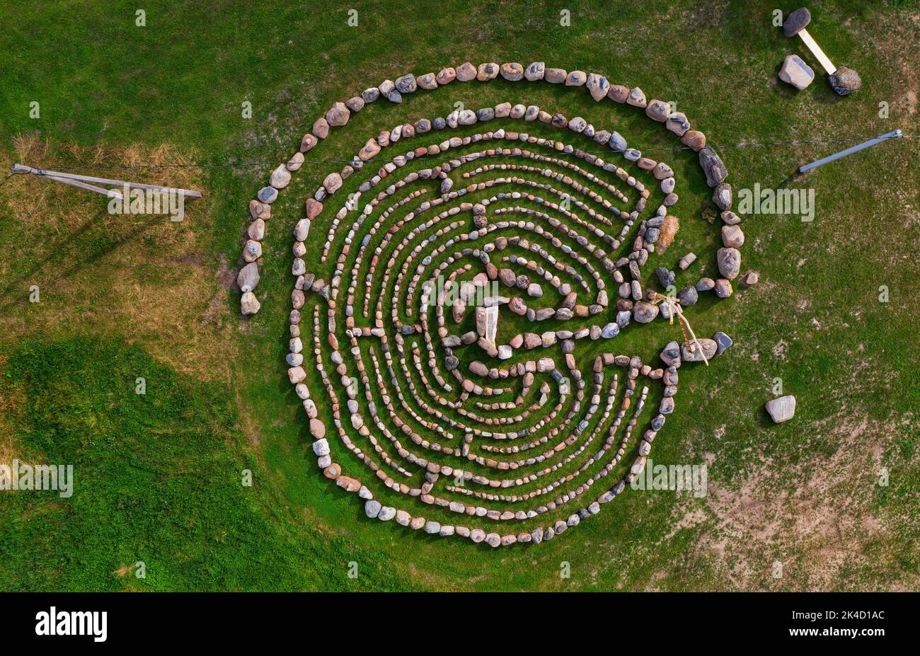 Spiral labyrinth made of stones, Lithuania, aerial view Stock Photo