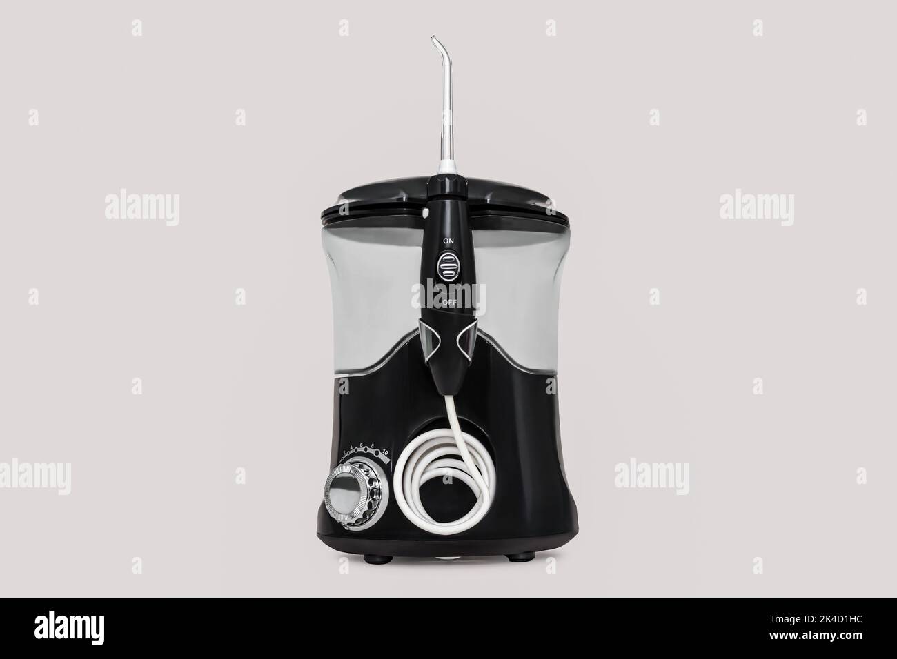 Black oral irrigator, water flosser or dental water jet isolated on