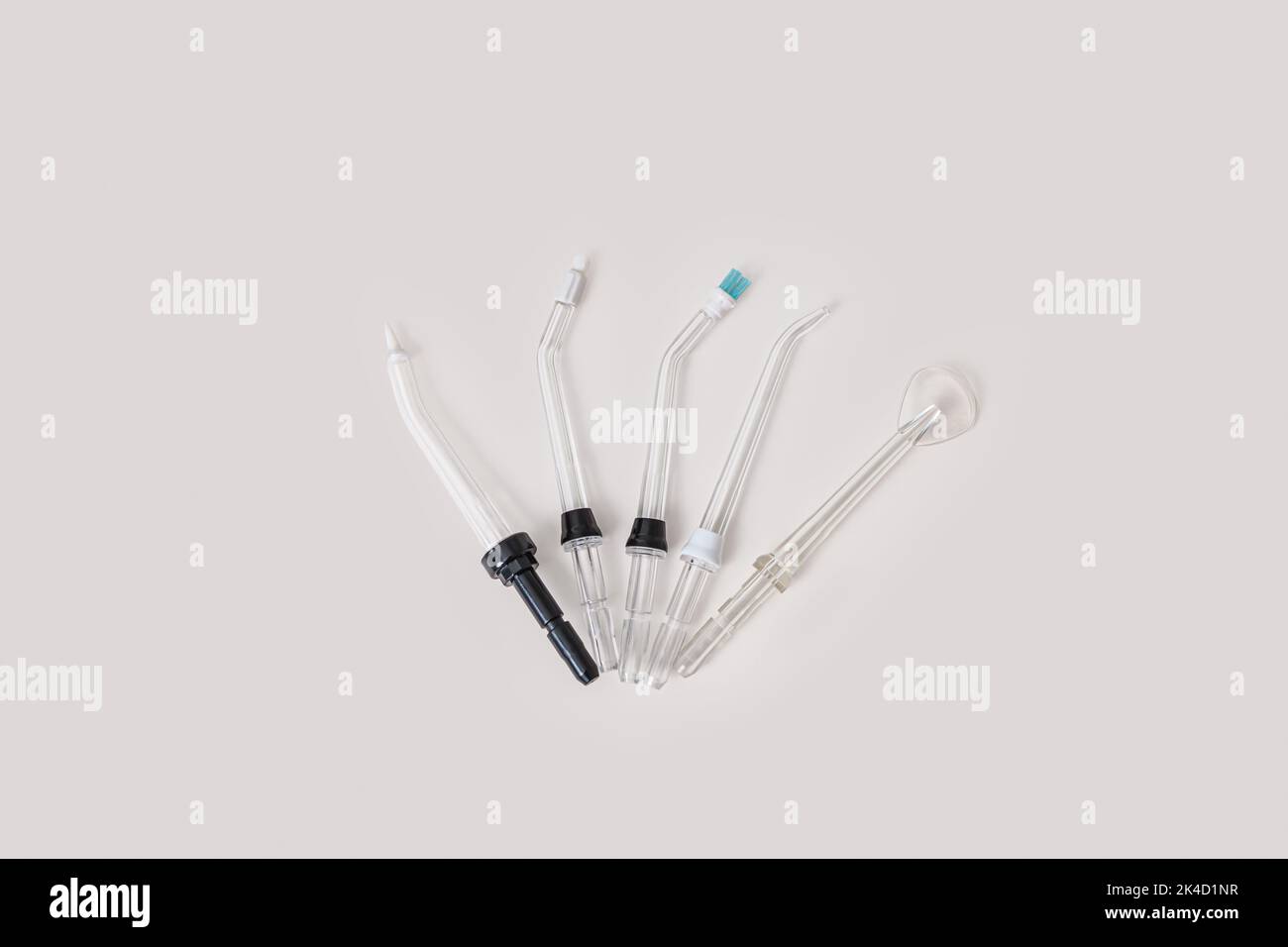 five tips for oral irrigator, water flosser or dental water isolated on