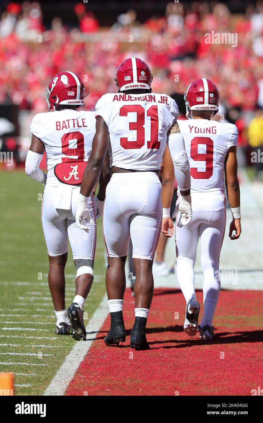 October 1, 2022: Alabama team captains Will Anderson Jr #31, Bryce Young #9 and Jordan Battle #9 make their way up the sidelines before the game. Alabama defeated Arkansas 49-26 in Fayetteville, AR, Richey Miller/CSM Stock Photo