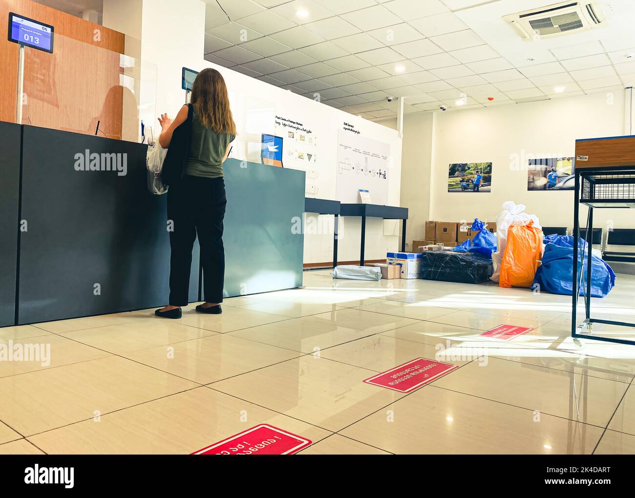 Tbilisi, 25 october, 2022 customer stand alone in post