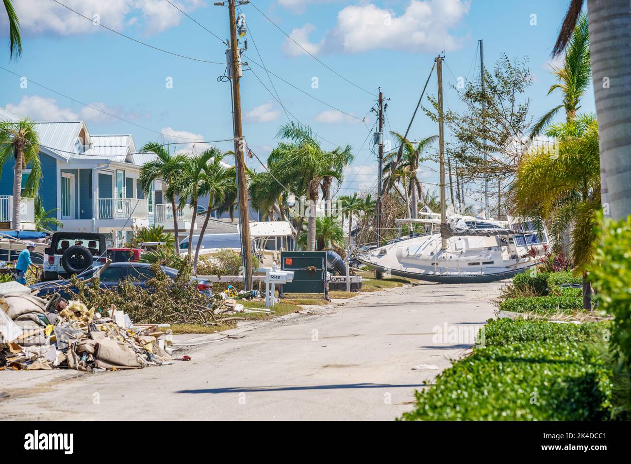 Fort Myers, FL, USA - October 1, 2022: Neighborhoods filled with misplaced boats and debris after Hurricane Ian Stock Photo