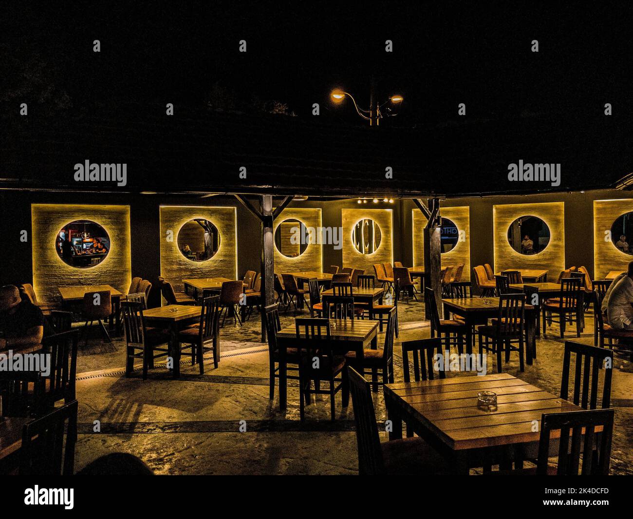 A restaurant interior at night Stock Photo - Alamy