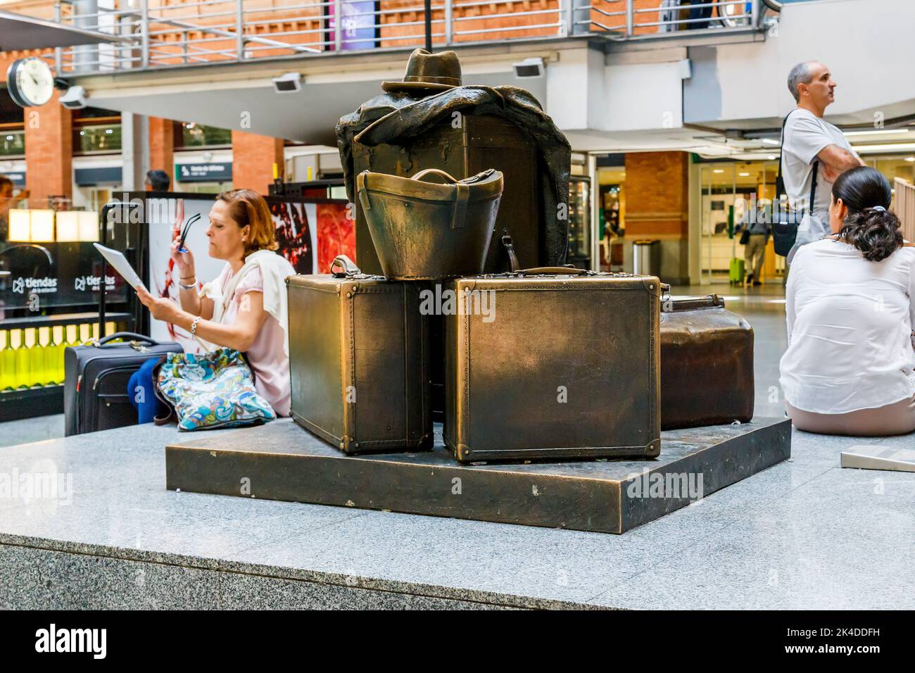 MADRID, SPAIN - MAY 24, 2017:It is a monument to forgotten luggage in the waiting hall of railway station Atocha. Stock Photo