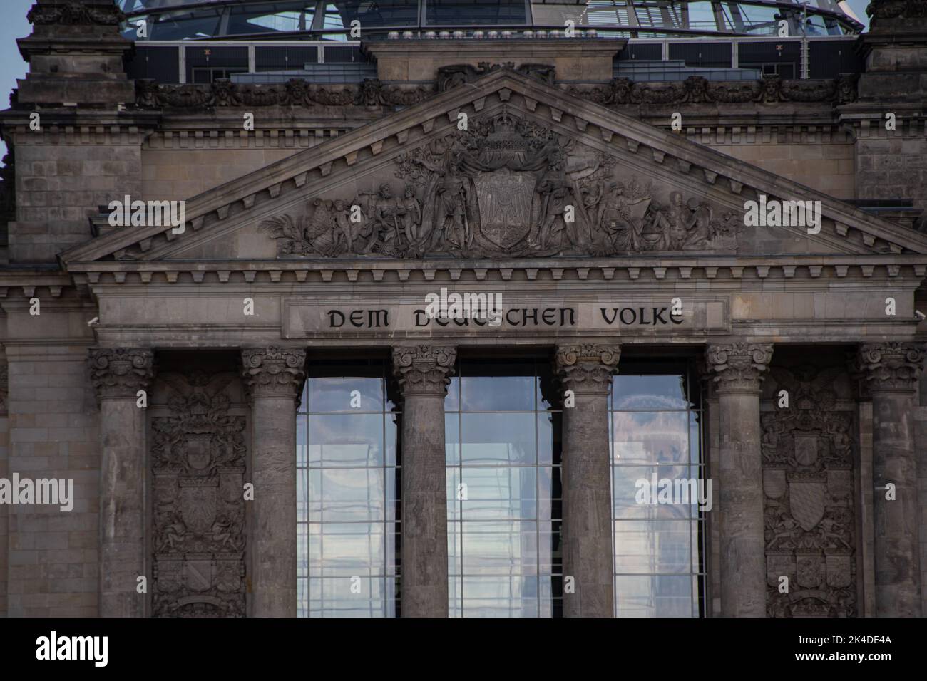 Berlin, Germany  28 June 2022,  Close-up of the German Reichstag building with the inscription 'Dem Deutschen Volke' Stock Photo