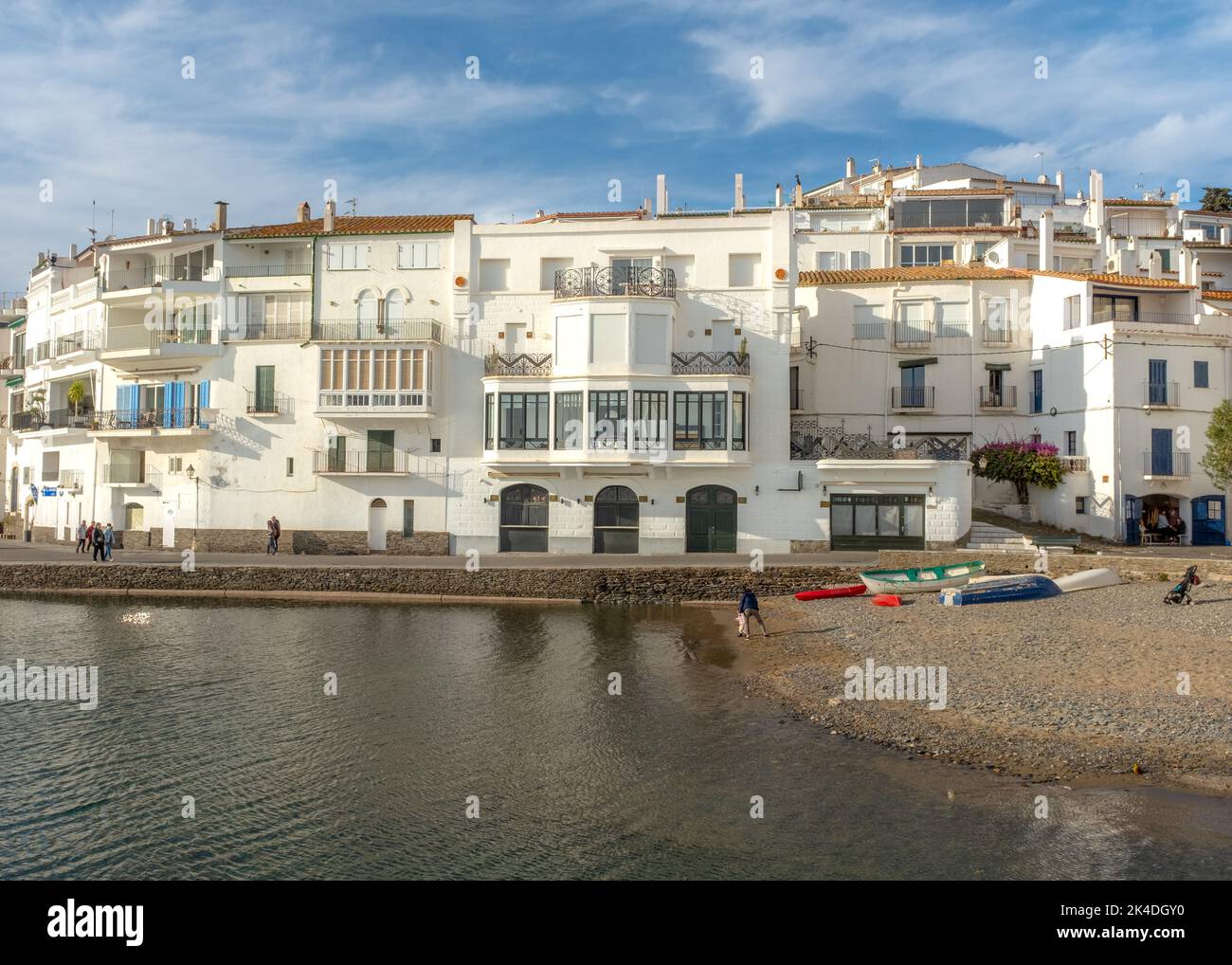 Cadaqués, Spain - February 25, 2022: View on Catalan modernist buildings. Photo taken in winter, with some unrecognizable persons walking along the se Stock Photo