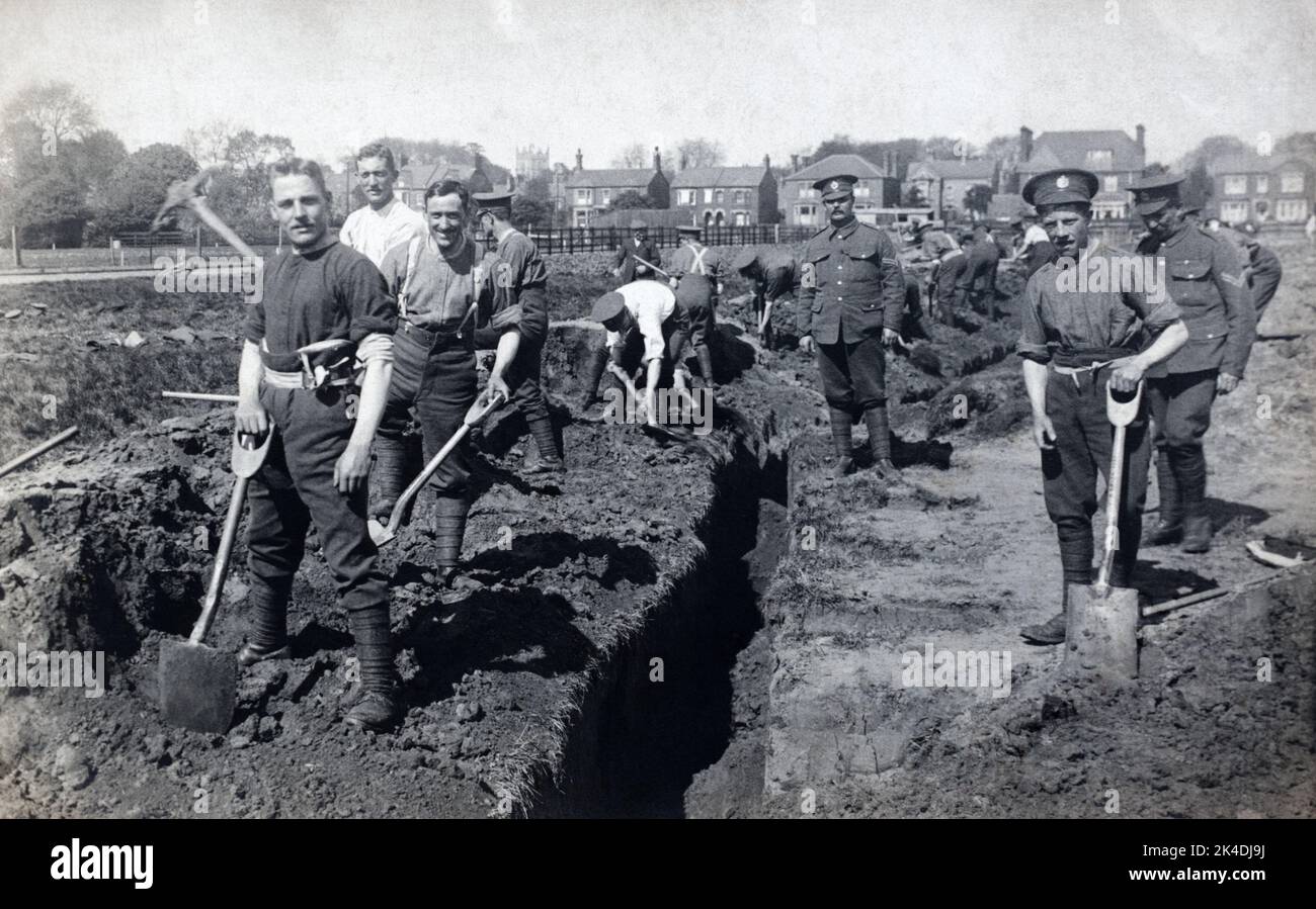 First World War era portrait of a British soldiers of the Royal Engineers digging a small trench in 1915. Stock Photo