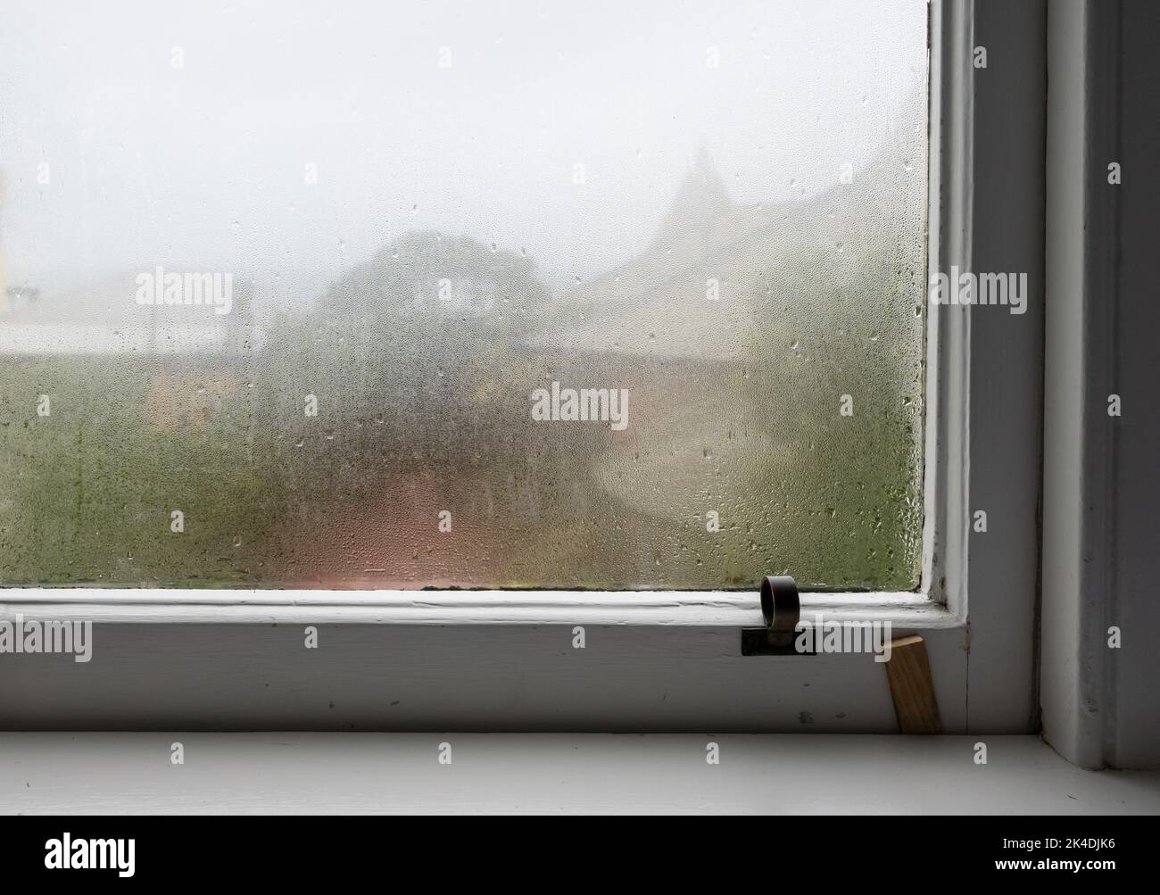 Condensation on an old window in winter time Stock Photo Alamy