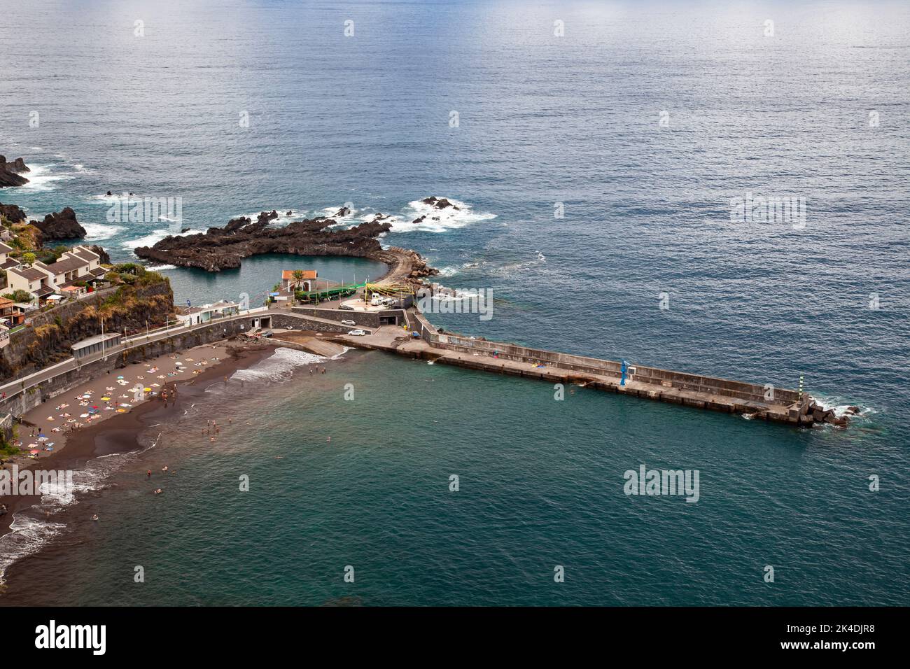 Black sandy beach and bathing bay of Seixal,  Madeira, Portugal, Europe Stock Photo