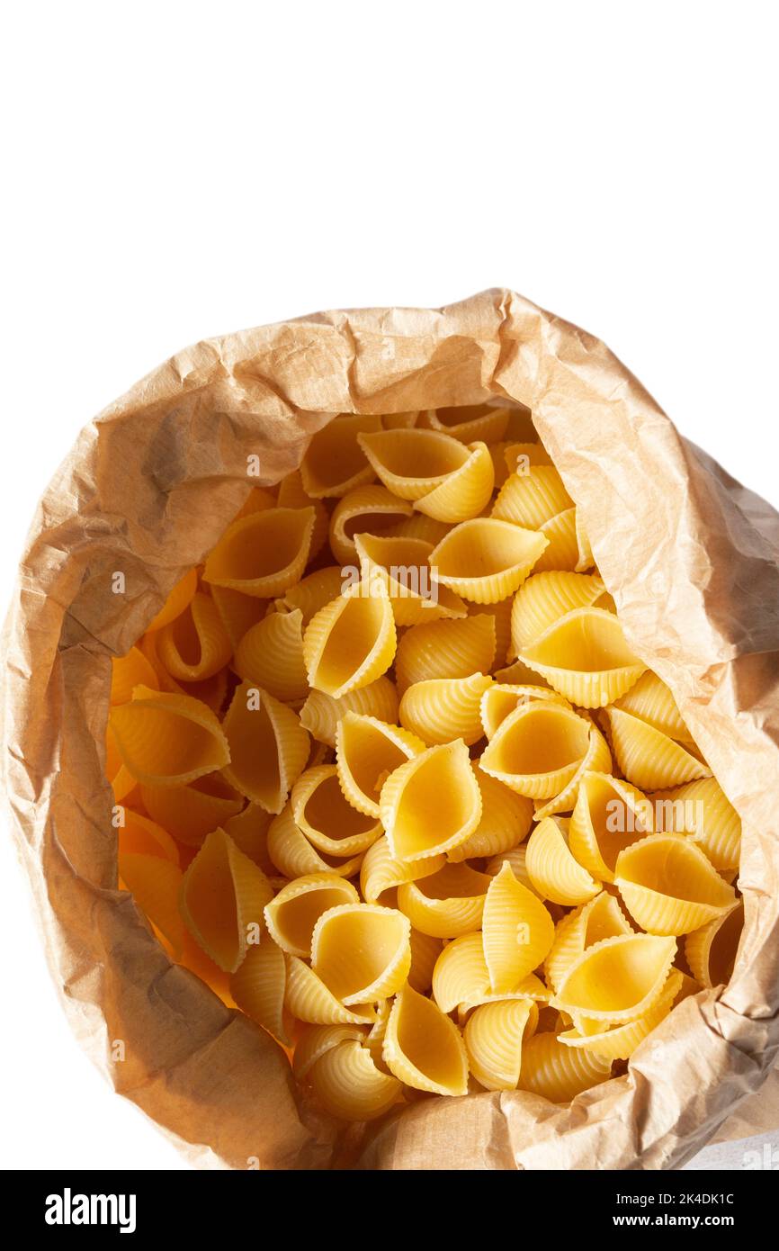 Conchiglie pasta shells in a brown paper bag. Eco-friendly recycling