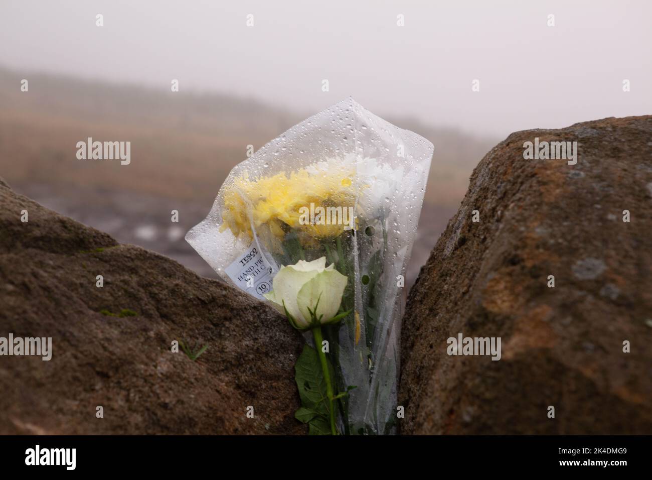 Saddleworth, Oldham, UK. 2nd October, 2022. Floral tribute left by the roadside at the scene of the recent police search for human remains in relation to the Moors Murders Peter Liggins/Alamy Live News Stock Photo
