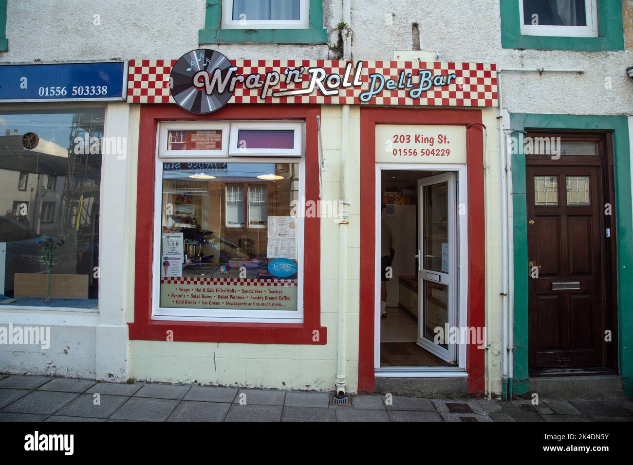 Castle Douglas, Dumfries & Galloway, Scotland, September 24th 2022, photograph featuring the 'Wrap 'n' roll' deli bar on King Street in the town Stock Photo