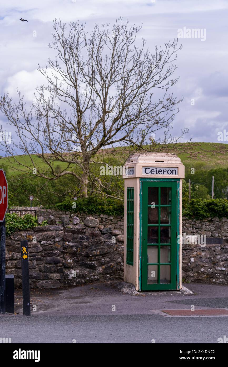 Old Irish phone booth, public payphone in ireland Stock Photo