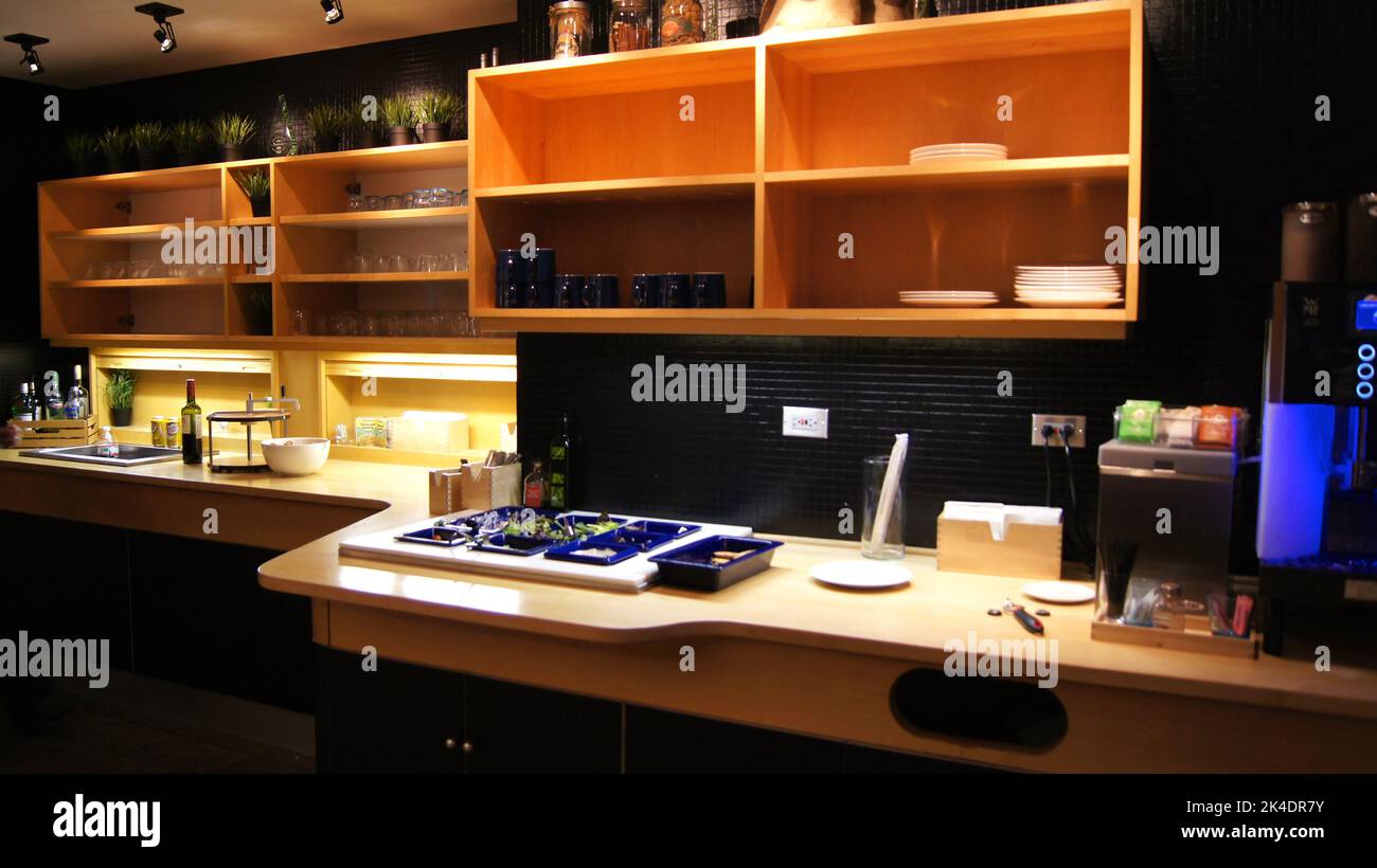 CHICAGO, ILLINOIS, UNITED STATES - DECEMBER 16, 2015: Self-serve alcoholic beverage bar in airport lounge for frequent flyers at Chicago O'Hare Stock Photo