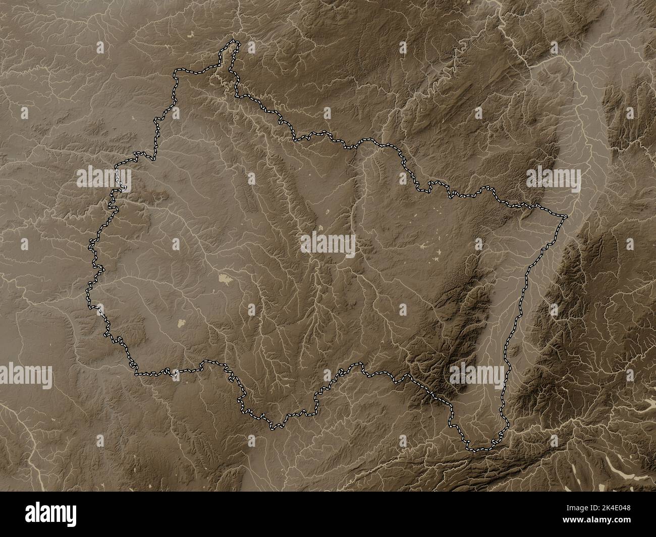 Grand Est, region of France. Elevation map colored in sepia tones with