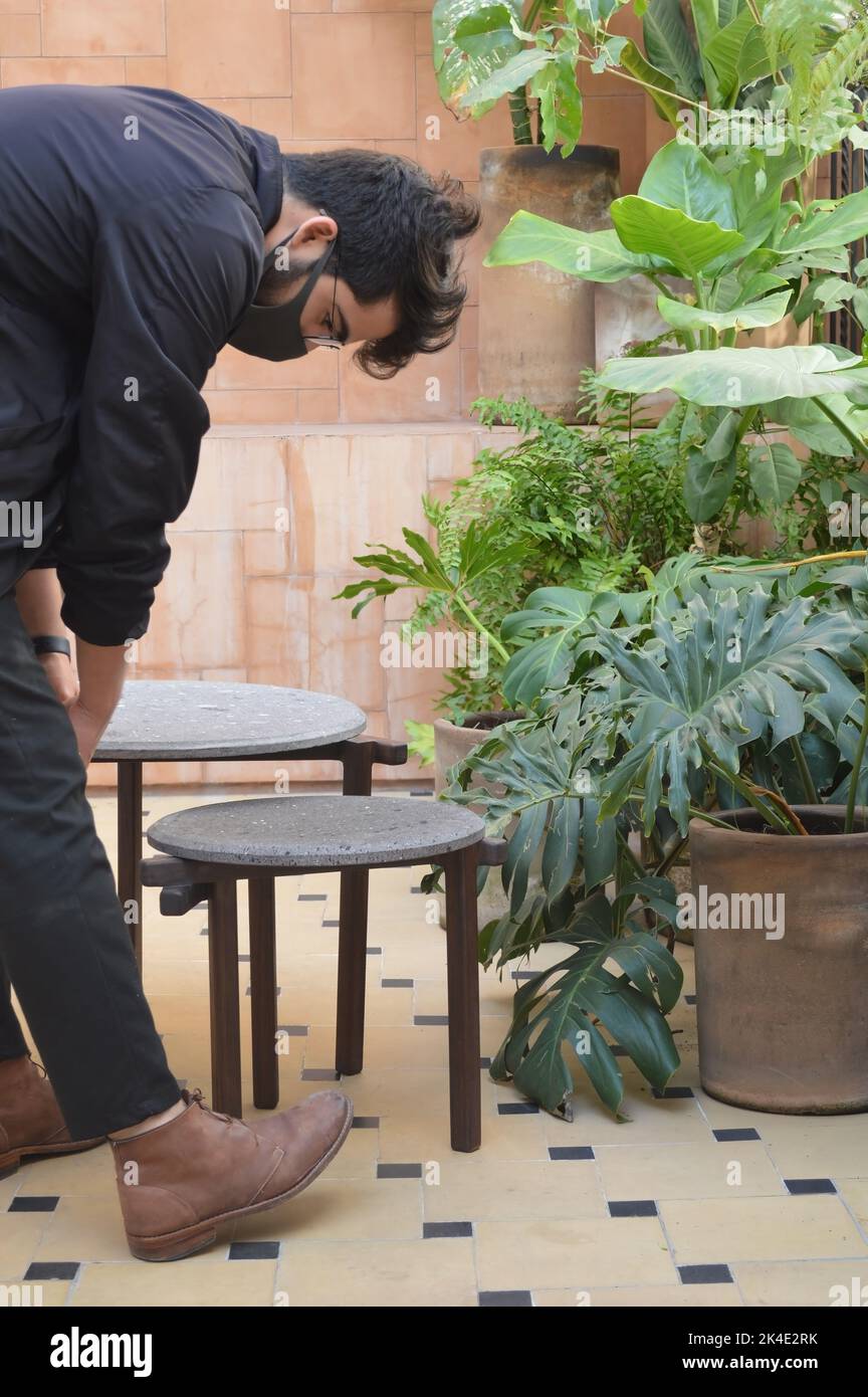 outdoor terrace with outdoor coffee tables, stone top and solid wood or