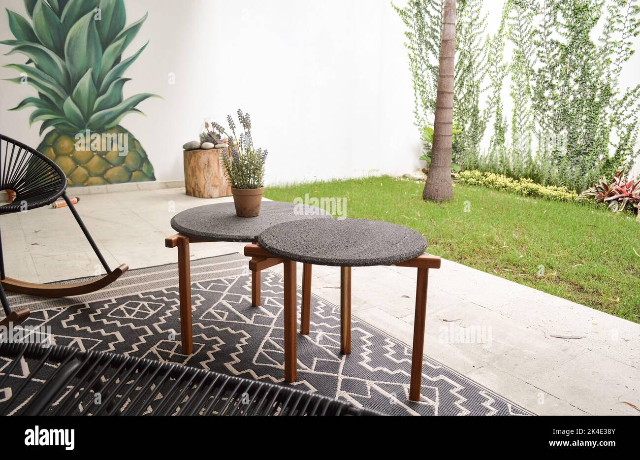 outdoor terrace with outdoor coffee tables, stone top and solid wood or
