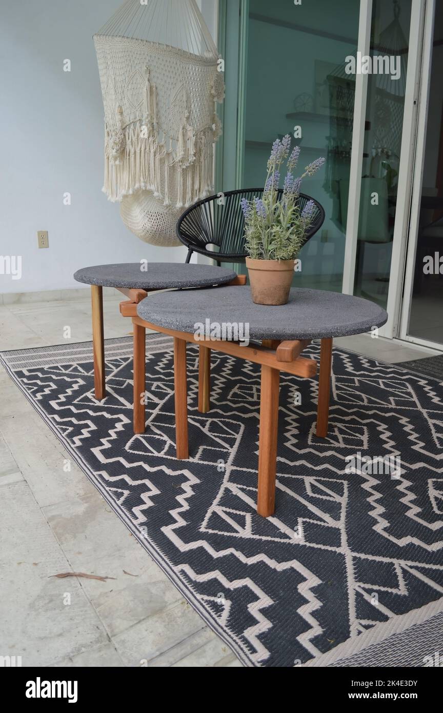 outdoor terrace with outdoor coffee tables, stone top and solid wood or