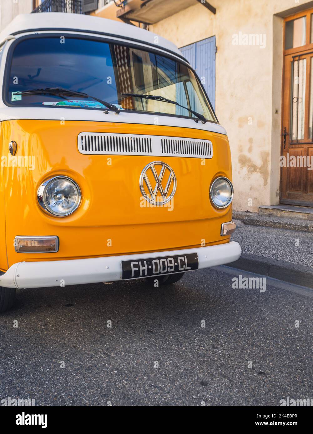 Loriol sur Drome, France -  17 September , 2022: Vintage yellow Volkswagen camper T2 Westfalia on the street. Classic car exhibition in Loriol sur Dro Stock Photo